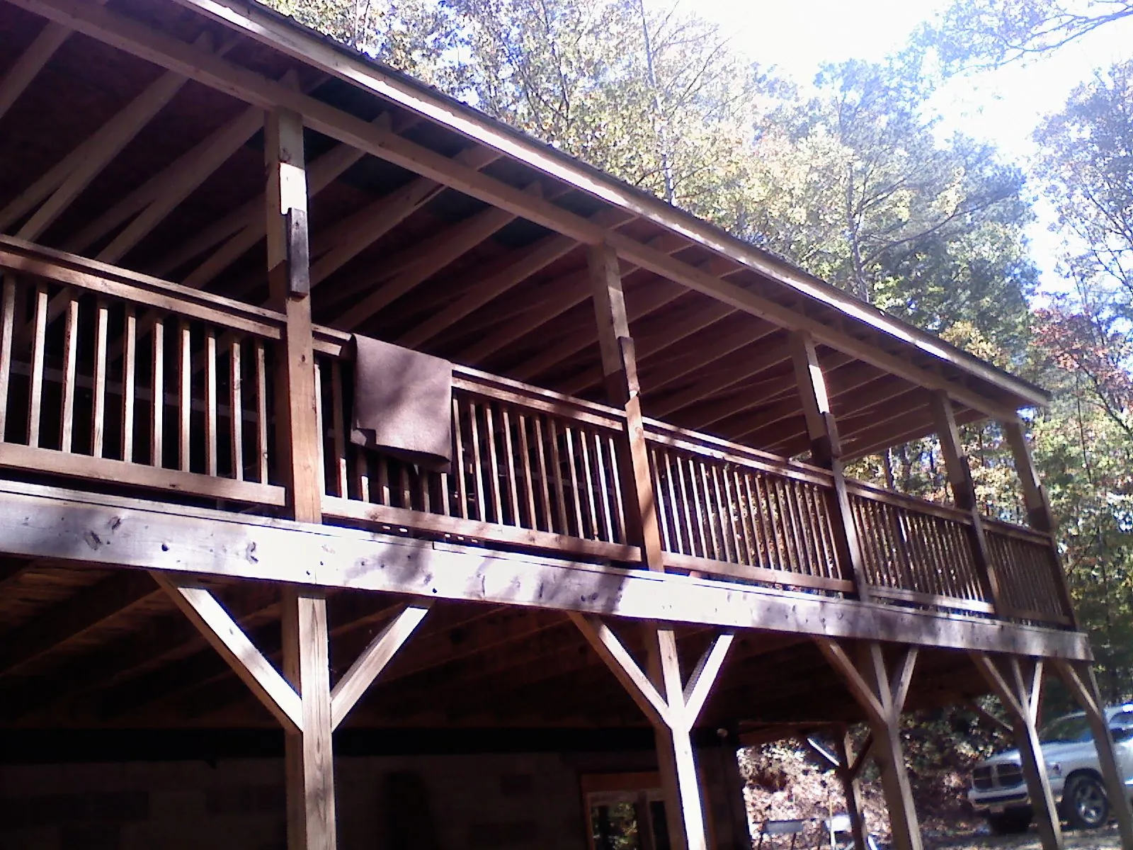 Timber framing under a new elevated porch and deck — Roof Leak Repair in Niles by Roofing Brothers